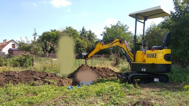 Dig the pond with a mini excavator