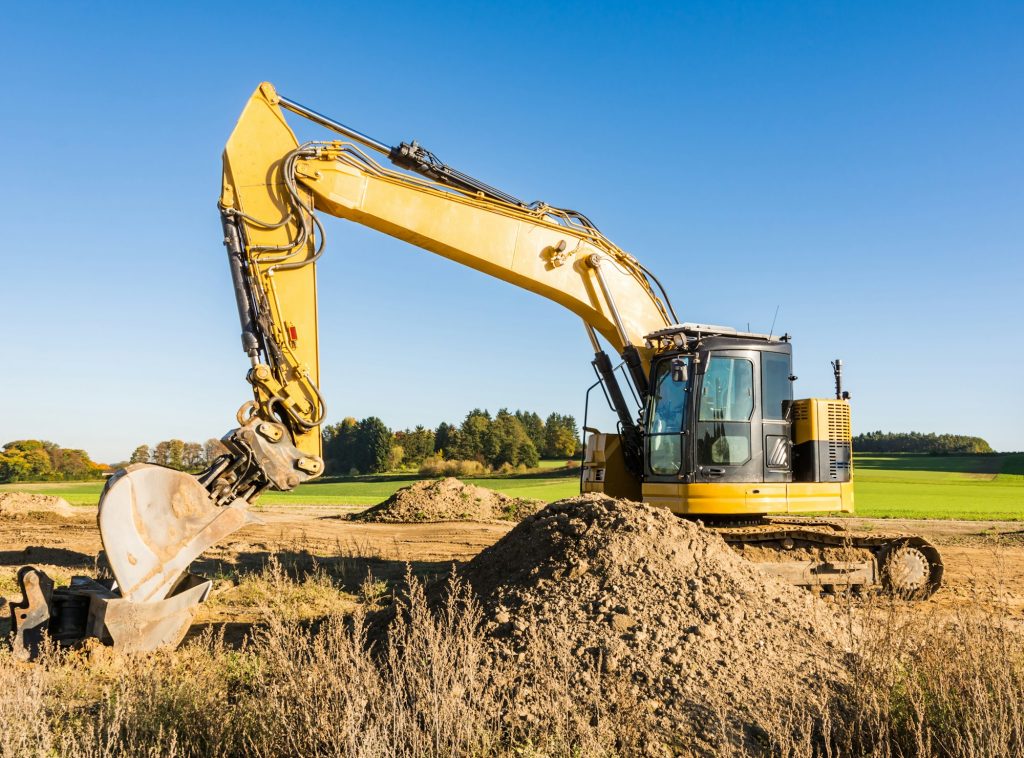 Yellow earth mover at a construction site